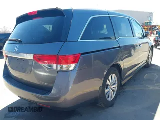 2015 Honda Odyssey EX-L with VIN 5FNRL5H66FB063215, listed as a IAAI auction lot 41846532 with 153,048 mi miles and . Bid and sale history available at carsss.com. Image 4.