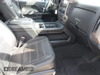 2015 GMC Sierra 2500HD available WiFi Denali with VIN 1GT120E8XFF623208, listed as a IAAI auction lot 41607260 with 98,032 mi miles. Bid and sale history available at carsss.com. Image 5.