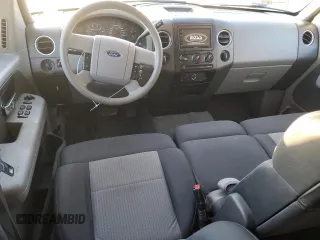 2007 Ford F-150 XLT with VIN 1FTRW14W47KC40614, listed as a Copart auction lot 42415565 with 295,398 mi miles and Salvage title. Bid and sale history available at DreamBid. Image 8.