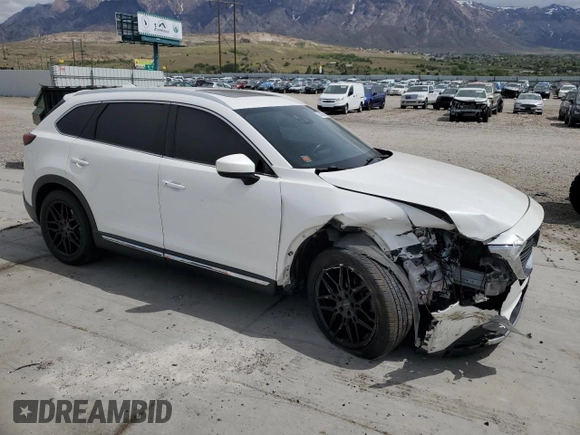 2016 Mazda CX-9 Signature with VIN JM3TCBEY7G0118322, listed as a Copart auction lot 54826655 with 123,618 mi miles and Salvage title. Bid and sale history available at DreamBid. Image 4.