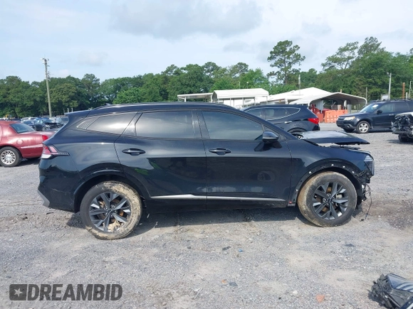 2023 Kia Sportage SX-Prestige with VIN KNDPXCAG1P7020251, listed as a IAAI auction lot 42364221 with 129,885 mi miles and . Bid and sale history available at DreamBid. Image 14.