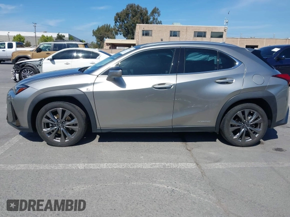 2021 Lexus UX 250h F Sport with VIN JTHR9JBH0M2037127, listed as a IAAI auction lot 42156811 with 20,720 mi miles and . Bid and sale history available at DreamBid. Image 14.