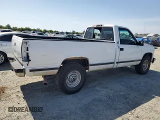 1999 GMC Sierra 1500 z VIN 1GTGC24RXXR721667, wystawiony jako Copart lot #58575985 z przebiegiem 201 752 mil mil oraz Czysty tytuł • Clean title. Historia ofert i sprzedaży dostępna na DreamBid. Obrazek 3.