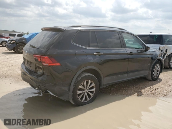 2018 Volkswagen Tiguan S with VIN 3VV1B7AX9JM020833, listed as a Copart auction lot 54539565 with 69,904 mi miles and Salvage title. Bid and sale history available at DreamBid. Image 3.