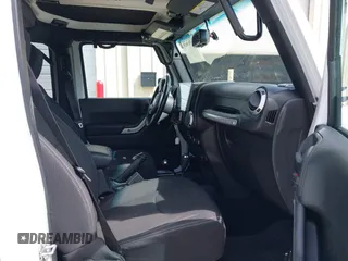 2017 Jeep Wrangler Unlimited Sahara with VIN 1C4BJWEG8HL734572, listed as a IAAI auction lot 41863636 with 123,979 mi miles. Bid and sale history available at carsss.com. Image 5.