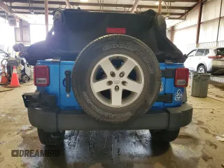 2015 Jeep Wrangler Freedom Edition z VIN 1C4AJWAG7FL520090, wystawiony jako Copart lot #62756975 z przebiegiem Nie podano mil oraz Szkoda całkowita • Salvage title. Historia ofert i sprzedaży dostępna na DreamBid. Obrazek 6.