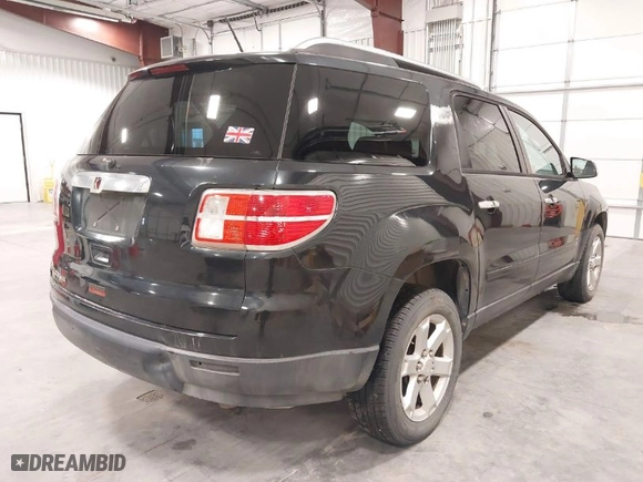 2009 Saturn Outlook XE with VIN 5GZER13D29J215708, listed as a IAAI auction lot 41384783 with 211,719 mi miles. Bid and sale history available at carsss.com. Image 4.