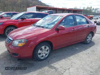 2009 Kia Spectra EX with VIN KNAFE221495665378, listed as a IAAI auction lot 42036945 with 153,254 mi miles. Bid and sale history available at carsss.com. Image 2.