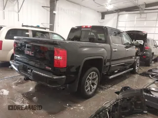 2015 GMC Sierra 1500 SLT with VIN 3GTU2VEC6FG526374, listed as a IAAI auction lot 41875975 with 207,561 mi miles and . Bid and sale history available at DreamBid. Image 4.