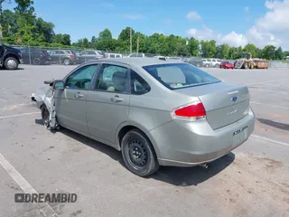 2008 Ford Focus SE with VIN 1FAHP35N68W198442, listed as a IAAI auction lot 39509774 with 180,247 mi miles. Bid and sale history available at carsss.com. Image 3.