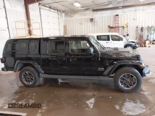 2020 Jeep Gladiator Overland with VIN 1C6HJTFG5LL140142, listed as a IAAI auction lot 42452310 with 111,884 mi miles and . Bid and sale history available at DreamBid. Image 13.
