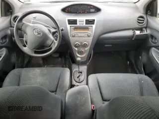 2012 Toyota Yaris with VIN JTDBT4K35CL037319, listed as a Copart auction lot 46098585 with 126,039 mi miles and Salvage Title. Bid and sale history available at DreamBid. Image 8.