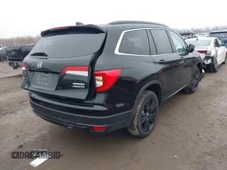 2021 Honda Pilot Special Edition with VIN 5FNYF6H23MB047850, listed as a IAAI auction lot 41565802 with Not Provided miles. Bid and sale history available at carsss.com. Image 4.