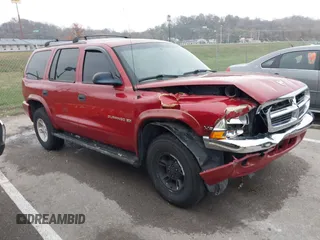 1999 Dodge Durango z VIN 1B4HS28Y0XF551956, wystawiony jako IAAI lot #40927197 z przebiegiem 199 560 mil mil oraz . Historia ofert i sprzedaży dostępna na DreamBid. Obrazek 1.