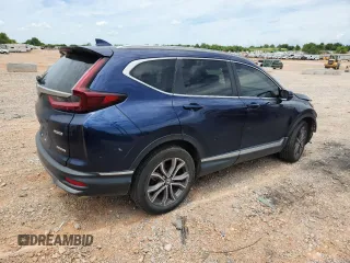 2020 Honda CR-V Touring с VIN 2HKRW2H9XLH631074, выставлен на аукционе Copart как лот 62957255 с пробегом 21 460 миль миль и Списание • Salvage title. История ставок и продаж доступна на DreamBid. Изображение 3.