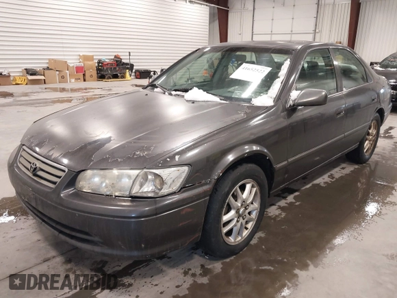 2001 Toyota Camry LE z VIN JT2BF28K110307972, wystawiony jako IAAI lot #41652522 z przebiegiem 201 631 mil mil oraz . Historia ofert i sprzedaży dostępna na DreamBid. Obrazek 2.