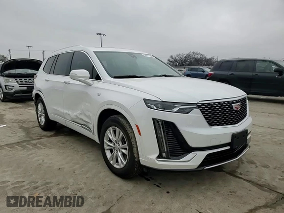 2024 Cadillac XT6 FWD Luxury with VIN 1GYKPAR47RZ720446, listed as a Copart auction lot 43964105 with 10,728 mi miles and Salvage Title. Bid and sale history available at carsss.com. Image 12.