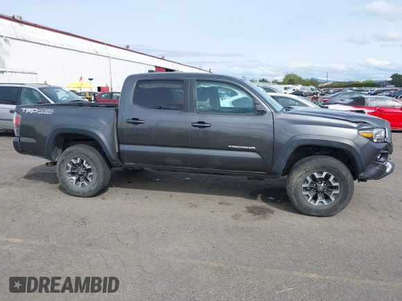2020 Toyota Tacoma SR5 with VIN 3TMCZ5AN7LM321061, listed as a IAAI auction lot 41985533 with 32,111 mi miles and . Bid and sale history available at DreamBid. Image 14.