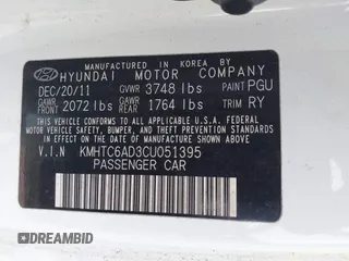 2012 Hyundai Veloster w/Gray Int with VIN KMHTC6AD3CU051395, listed as a IAAI auction lot 42489038 with 153,319 mi miles and . Bid and sale history available at DreamBid. Image 9.