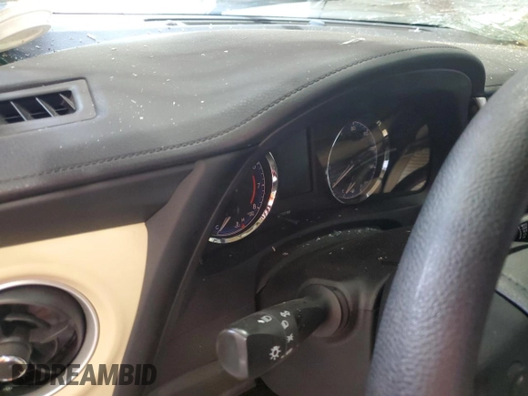 2019 Toyota Corolla L z VIN 5YFBURHE0KP861219, wystawiony jako Copart lot #59435715 z przebiegiem Nie podano mil oraz Szkoda całkowita • Salvage title. Historia ofert i sprzedaży dostępna na DreamBid. Obrazek 9.