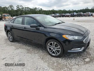 2017 Ford Fusion SE z VIN 3FA6P0H75HR228505, wystawiony jako Copart lot #53251205 z przebiegiem 144 898 mil mil oraz Czysty tytuł • Clean title. Historia ofert i sprzedaży dostępna na DreamBid. Obrazek 4.