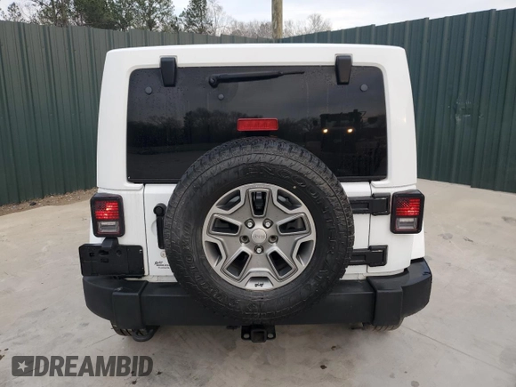 2016 Jeep Wrangler Unlimited Rubicon with VIN 1C4BJWFG7GL179689, listed as a Copart auction lot 48708935 with 138,118 mi miles and Clean Title. Bid and sale history available at carsss.com. Image 6.