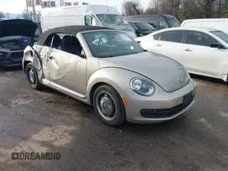 2013 Volkswagen Beetle 2.5L with VIN 3VW5P7AT3DM800312, listed as a IAAI auction lot 41806618 with 116,388 mi miles and . Bid and sale history available at DreamBid. Image 1.