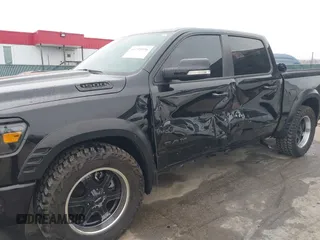 2022 Ram 1500 Big Horn with VIN 1C6SRFFT3NN287385, listed as a IAAI auction lot 41793596 with 12,277 mi miles and . Bid and sale history available at DreamBid. Image 6.