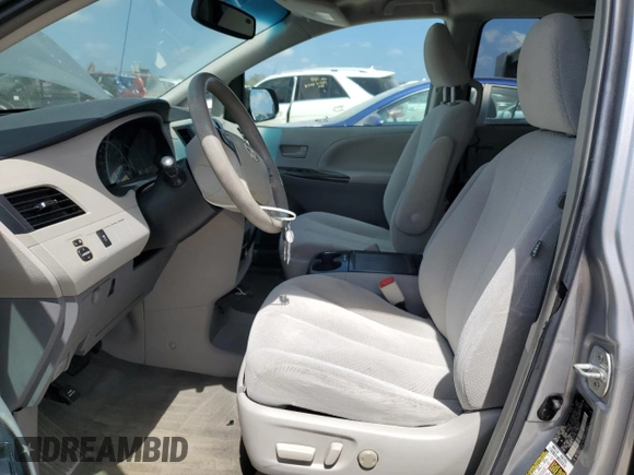 2013 Toyota Sienna LE AAS with VIN 5TDKK3DC1DS377268, listed as a Copart auction lot 54892765 with 186,338 mi miles and Salvage Title. Bid and sale history available at DreamBid. Image 7.