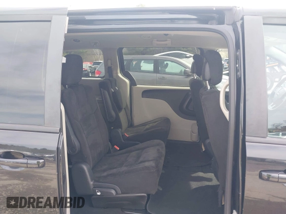 2017 Dodge Grand Caravan SE z VIN 2C4RDGBG3HR687183, wystawiony jako IAAI lot #41971615 z przebiegiem 158 201 mil mil oraz . Historia ofert i sprzedaży dostępna na DreamBid. Obrazek 8.