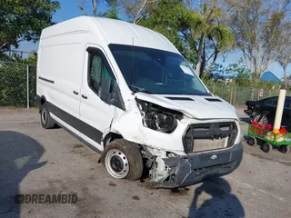 2020 Ford Transit Cargo with VIN 1FTBW1X82LKB49009, listed as a IAAI auction lot 41527513 with 52,802 mi miles and . Bid and sale history available at DreamBid. Image 1.