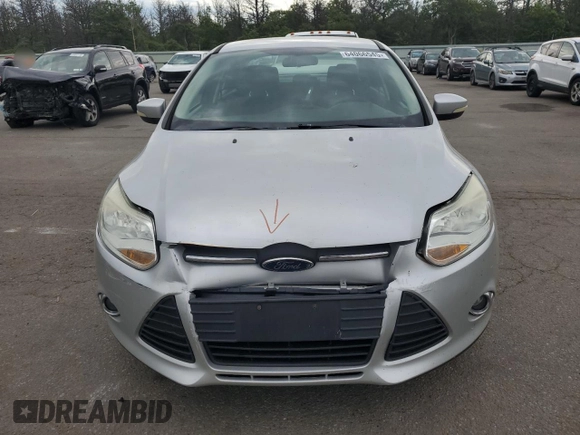 2012 Ford Focus SE with VIN 1FAHP3F2XCL202510, listed as a Copart auction lot 64066545 with 77,828 mi miles and Salvage title. Bid and sale history available at DreamBid. Image 5.