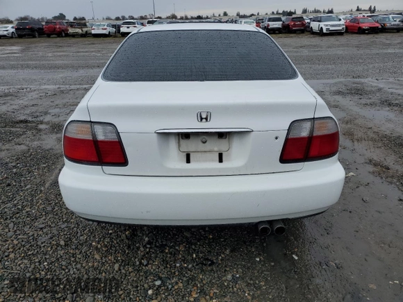 1997 Honda Accord EX with VIN 1HGCD565XVA178602, listed as a Copart auction lot 84797774 with 250,955 mi miles and Salvage Title. Bid and sale history available at DreamBid. Image 6.