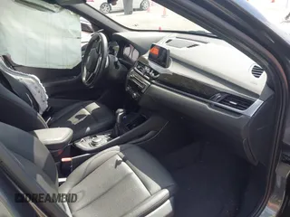 2018 BMW X1 xDrive28i with VIN WBXHT3C30J5L34702, listed as a IAAI auction lot 41935803 with 42,174 mi miles. Bid and sale history available at carsss.com. Image 5.