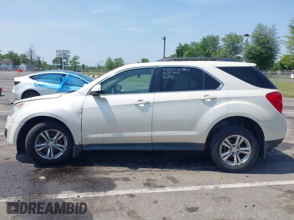 2015 Chevrolet Equinox LT z VIN 1GNALBEK9FZ115113, wystawiony jako IAAI lot #42402174 z przebiegiem 146 666 mil mil oraz . Historia ofert i sprzedaży dostępna na DreamBid. Obrazek 14.