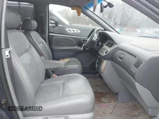 2002 Toyota Sienna LE with VIN 4T3ZF13C72U424470, listed as a IAAI auction lot 41508436 with 170,177 mi miles. Bid and sale history available at carsss.com. Image 5.