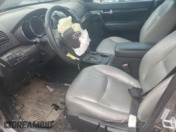 2012 Kia Sorento LX with VIN 5XYKT3A63CG212684, listed as a Copart auction lot 49747395 with Not Provided miles and Salvage Title. Bid and sale history available at DreamBid. Image 7.
