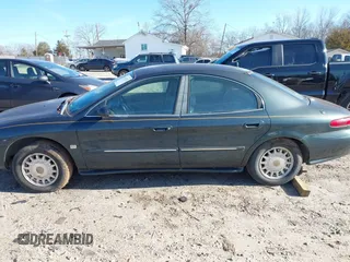 1998 Mercury Sable LS Premium Group z VIN 1MEFM53S0WA638842, wystawiony jako IAAI lot #41557457 z przebiegiem 153 443 mil mil oraz . Historia ofert i sprzedaży dostępna na DreamBid. Obrazek 17.