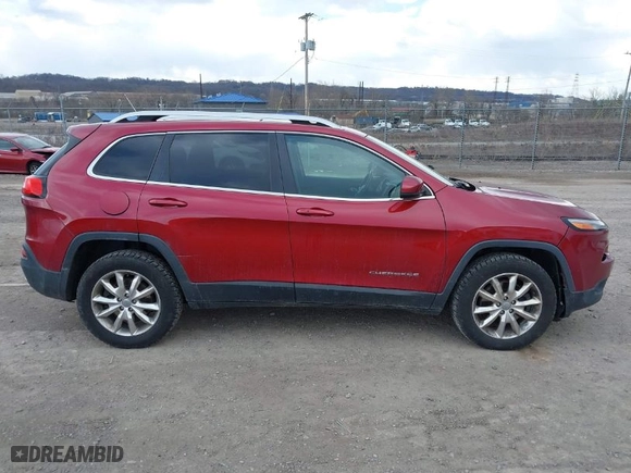 2014 Jeep Cherokee Limited with VIN 1C4PJMDB5EW219457, listed as a IAAI auction lot 41768074 with 124,195 mi miles. Bid and sale history available at carsss.com. Image 13.