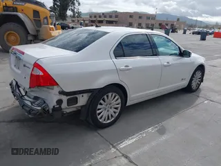 2010 Ford Fusion Hybrid with VIN 3FADP0L36AR140242, listed as a IAAI auction lot 41895012 with 236,943 mi miles and . Bid and sale history available at DreamBid. Image 4.