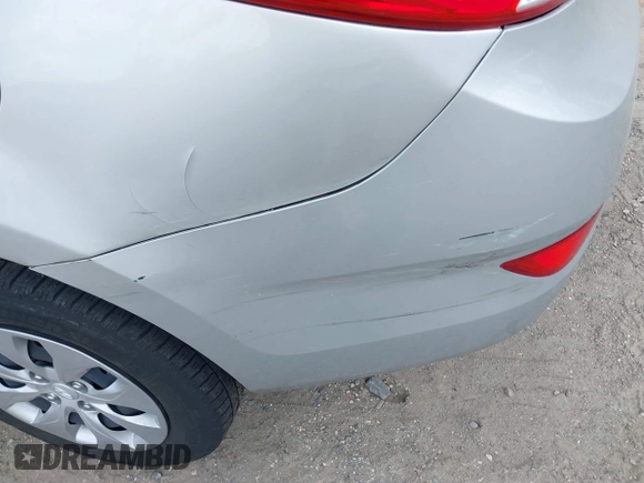 2016 Hyundai Accent SE z VIN KMHCT4AE0GU020544, wystawiony jako IAAI lot #41922723 z przebiegiem 96 718 mil mil oraz . Historia ofert i sprzedaży dostępna na DreamBid. Obrazek 13.