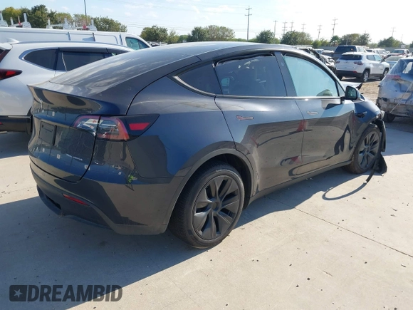 2024 Tesla Model Y Long Range with VIN 7SAYGDEE3RA321734, listed as a IAAI auction lot 40825378 with 4,440 mi miles and . Bid and sale history available at DreamBid. Image 4.