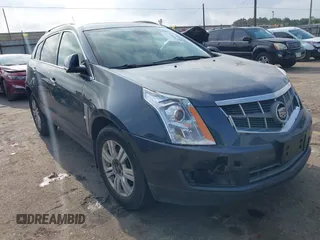2012 Cadillac SRX Luxury Collection z VIN 3GYFNAE39CS659562, wystawiony jako IAAI lot #42109525 z przebiegiem 151 051 mil mil oraz . Historia ofert i sprzedaży dostępna na DreamBid. Obrazek 1.