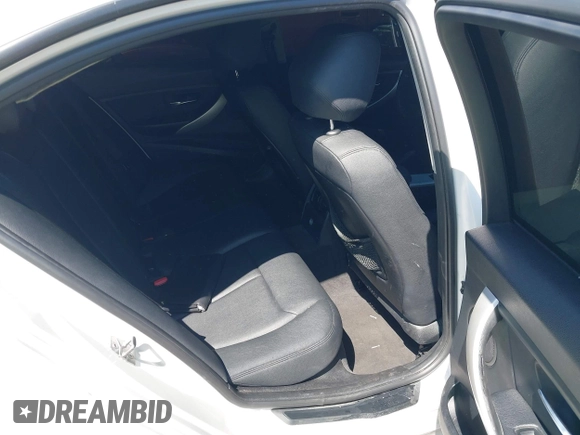 2014 BMW 3 Series 320i with VIN WBA3B1C51EK132083, listed as a IAAI auction lot 41985295 with 158,626 mi miles. Bid and sale history available at carsss.com. Image 8.