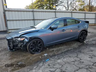 2018 Mazda Mazda6 Touring with VIN JM1GL1VM0J1330269, listed as a Copart auction lot 43992245 with 119,660 mi miles and Salvage Title. Bid and sale history available at carsss.com. Image 1.