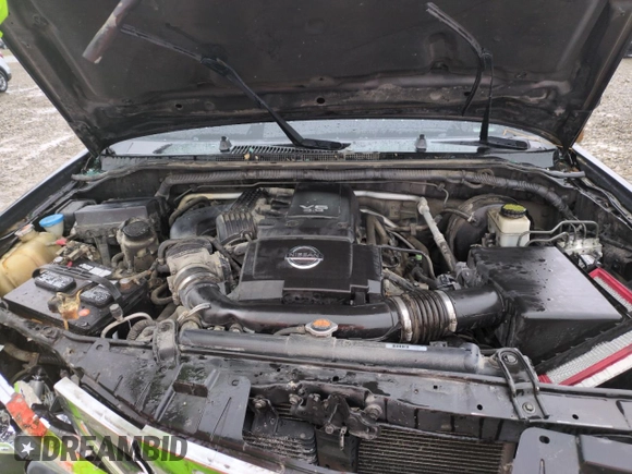 2012 Nissan Frontier Pro-4X z VIN 1N6AD0EV5CC427087, wystawiony jako Copart lot #53487845 z przebiegiem 225 076 mil mil oraz Szkoda całkowita • Salvage title. Historia ofert i sprzedaży dostępna na DreamBid. Obrazek 11.