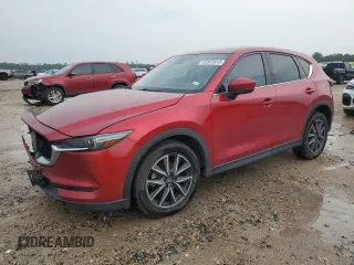 2018 Mazda CX-5 Grand Touring z VIN JM3KFADM5J0447586, wystawiony jako Copart lot #55953915 z przebiegiem 71 115 mil mil oraz Szkoda całkowita • Salvage title. Historia ofert i sprzedaży dostępna na DreamBid. Obrazek 1.