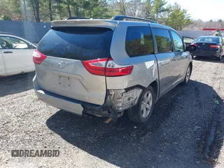 2017 Toyota Sienna LE Auto Access Seat with VIN 5TDKZ3DC0HS823184, listed as a IAAI auction lot 41823261 with 97,236 mi miles. Bid and sale history available at carsss.com. Image 4.