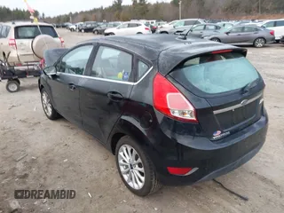 2017 Ford Fiesta Titanium with VIN 3FADP4FJ6HM112434, listed as a IAAI auction lot 41803424 with Not Provided miles and . Bid and sale history available at DreamBid. Image 3.