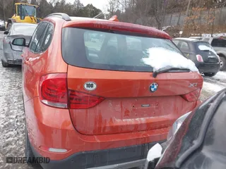 2015 BMW X1 xDrive28i with VIN WBAVL1C51FVY33650, listed as a IAAI auction lot 41400985 with 132,484 mi miles. Bid and sale history available at carsss.com. Image 17.